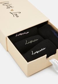 Black socks in a gift box, featuring embroidery in varying colors. Box has a light beige finish with "With Love" text in black and gold.