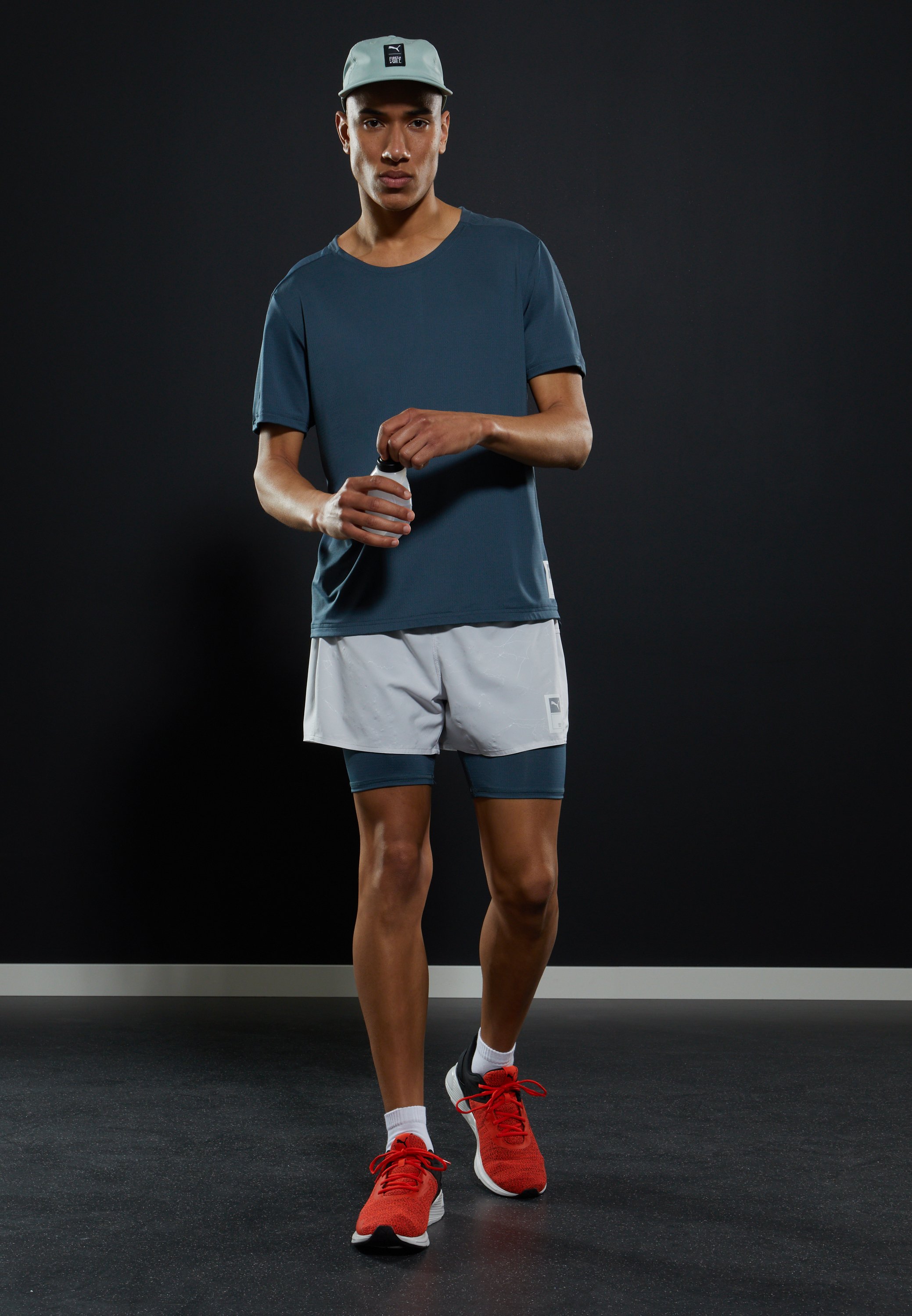 Puma RUN FIRST MILE SHORT - Sportiniai 