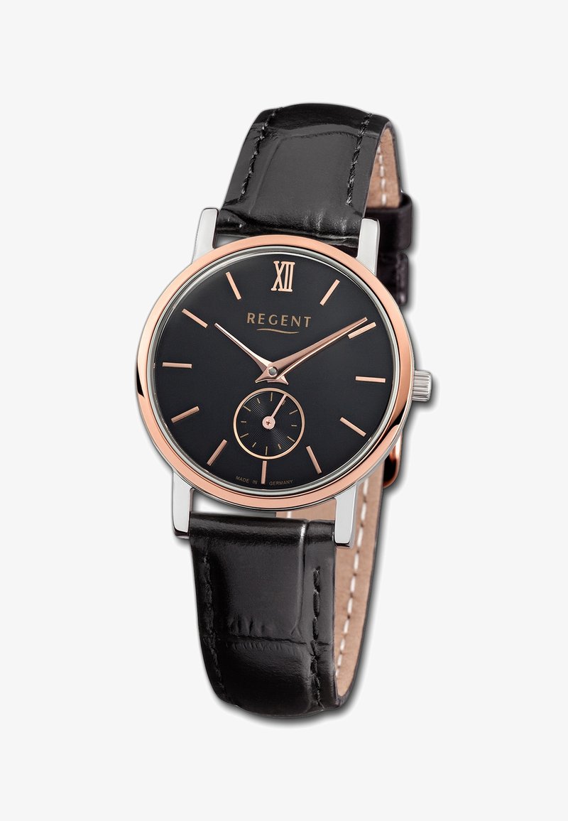 Montre à bracelet en cuir noir avec un boîtier rond en acier argenté, un cadran noir, des accents en or rose, le chiffre romain XII, et un petit sous-cadran.