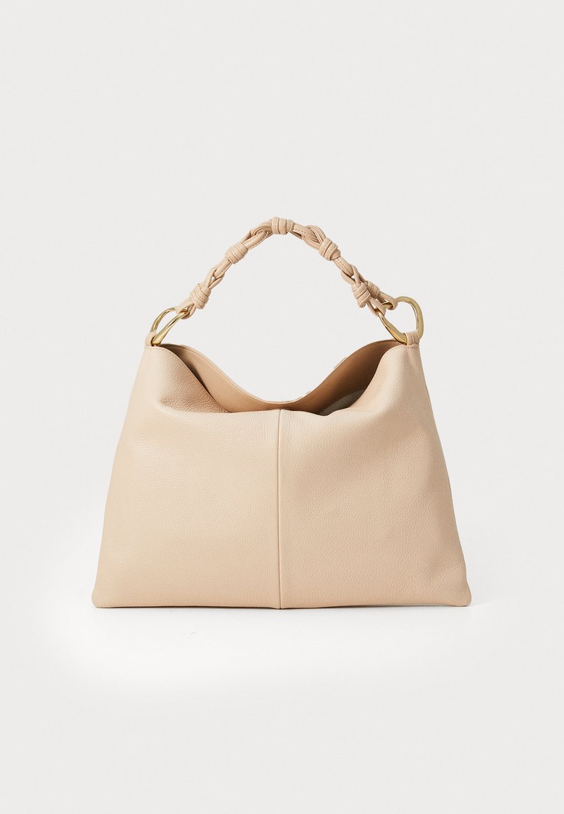 Soft, beige leather handbag with a braided handle and gold hardware. Features a slouchy design and a smooth texture with a central seam.