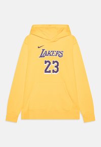 Felpa gialla in cotone con tasca frontale. Presenta la scritta "LAKERS" in viola sopra il numero "23" in bianco con accenti viola.