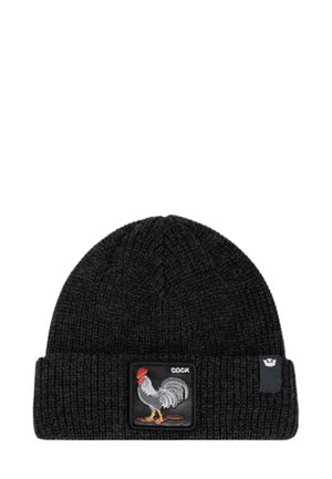 Bonnet tricoté noir avec texture côtelée et revers replié, arborant un patch brodé représentant un coq avec le mot « COQ ». 