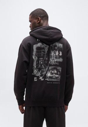 PUMA X HYROX HEAVYWEIGHT HOODIE - Džemperis su gobtuvu - black