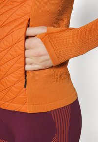 Athleta FLURRY FORCE INSULATED JACKET - Μπουφάν για τρέξιμο - foliage orange
