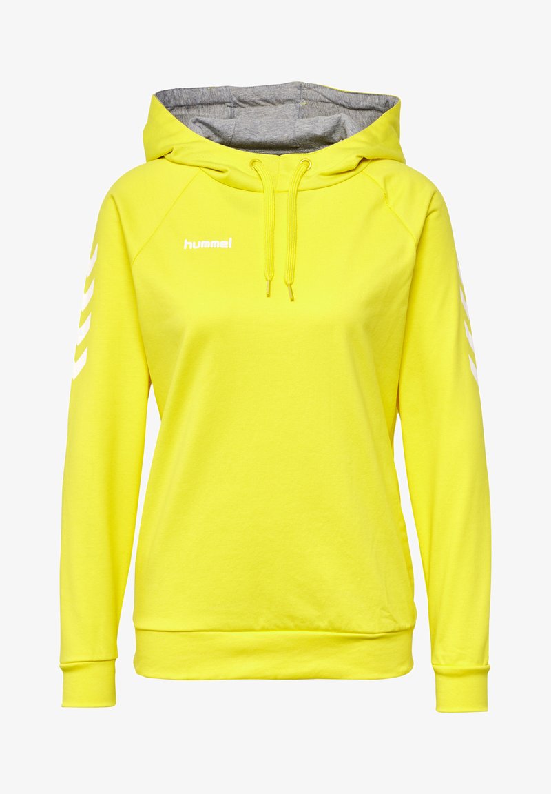 Żółta bluza z kapturem z szarym wnętrzem, z logo i białymi ukośnymi paskami na rękawach. Miękki materiał mieszanki bawełny.