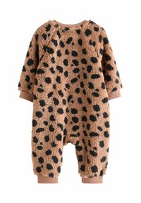 Jumpsuit in peluche marrone con macchie nere, dotato di maniche lunghe e polsini elastici sui polsi e sulle caviglie per una vestibilità aderente.