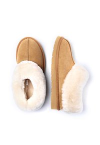 Tan suede slippers with a fluffy cream faux fur cuff. Rounded shape and textured sole for grip. Soft interior lining for comfort.