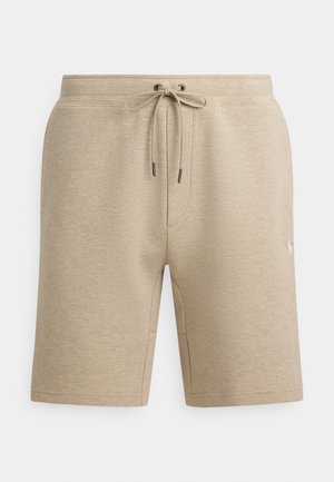 Calções desportivos bege feitos de tecido texturizado, com cintura elástica e cordão, e bolsos laterais. Detalhe de logótipo subtil.