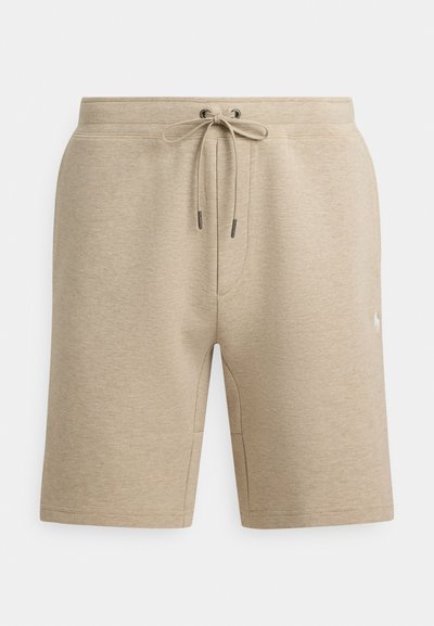 Beiga sportshorts i texturerat tyg med elastisk midjeresår och dragsko, samt sidofickor. Diskret logotypdetalj.