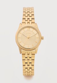 Χρυσού τόνου μεταλλικό ρολόι χειρός με συνδεδεμένο λουράκι, στρογγυλό καντράν, το ρωμαϊκό ψηφίο XII και το λογότυπο BOSS στο κέντρο, δείχνοντας την ώρα 10:11:36.