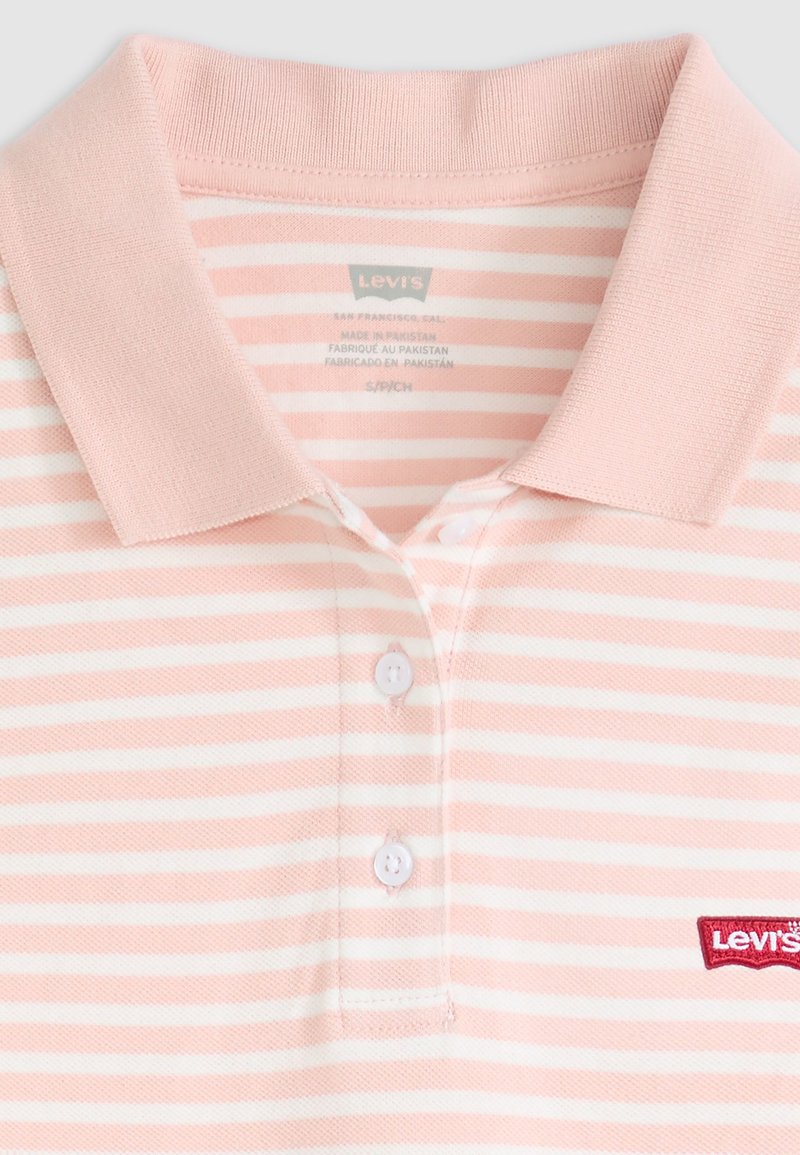 Rosa und weiße gestreifte Poloshirt mit Kragen, drei Knöpfen und rotem Levi's-Logo auf der linken Brust. Aus Baumwolle, strukturierte Oberfläche.