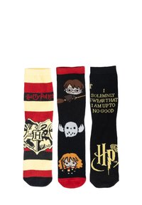 Tre paia di calze presentano: strisce rosse e gialle con "Harry Potter," nere con un teschio, e nere con testi e design di personaggi.