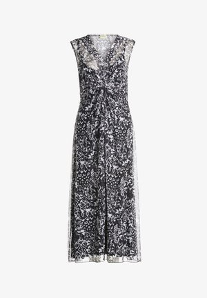 Zwart-wit bloemenpatroon jurk met V-hals, mouwloos ontwerp, geplooide voorkant en een vloeiende rok die tot halverwege de kuit reikt.