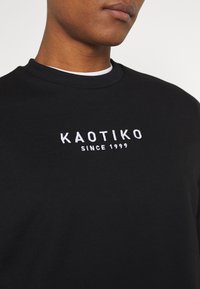 Kaotiko UNISEX CREW WALKER - Camisola - black