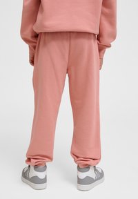 Hummel CLEAN ADJUSTABLE - Trainingsbroek - rose dawn