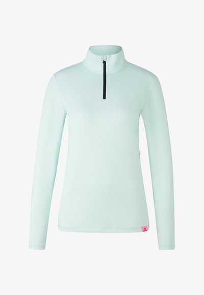 Jasno miętowy długi rękaw pulower z wysokim kołnierzem i czarnym zamkiem. Charakteryzuje się płaskimi szwami i małą różową metką na dolnym brzegu.