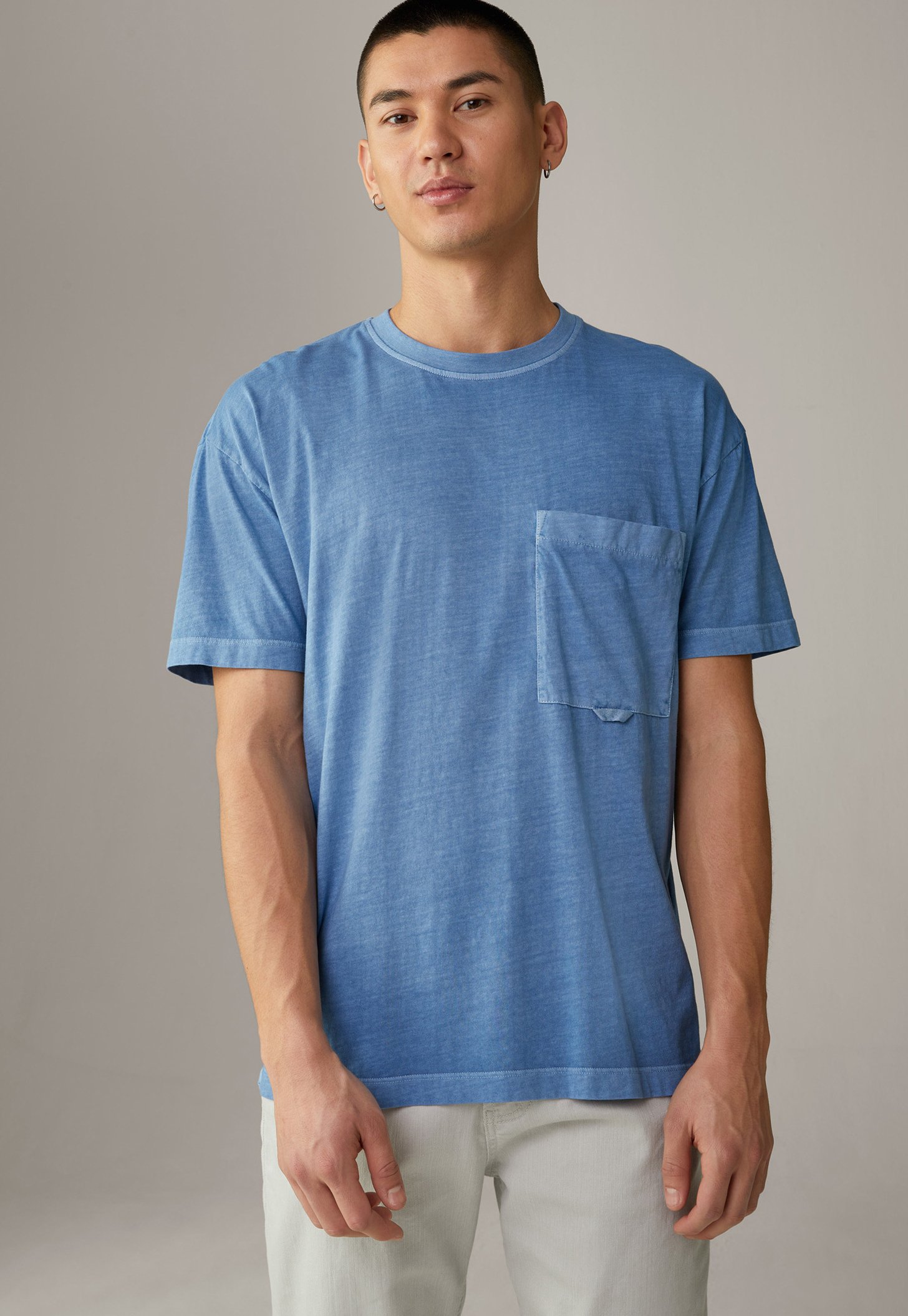 light blue tee shirt
