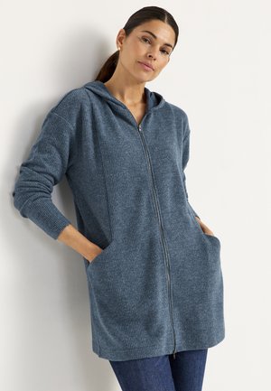 Blue zipper hoodie with textured fabric, long sleeves, and side pockets. The design features a hood and a relaxed fit.