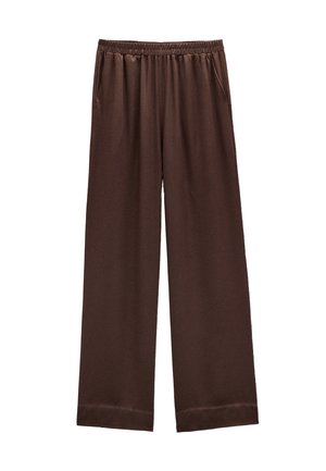 Brązowe spodnie typu wide-leg z miękkiego materiału, z elastycznym pasem, bocznymi kieszeniami oraz gładką teksturą z wywiniętym mankietem.