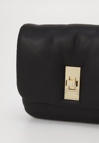 Tommy Hilfiger SOFT CROSSOVER - Cross body bag - black