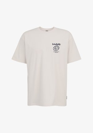 Helles beiges T-Shirt mit lockerer Passform, rundem Halsausschnitt und kurzen Ärmeln. Mit einem navyfarbenen Grafikdruck auf der linken Brustseite. Aus Baumwollmaterial.