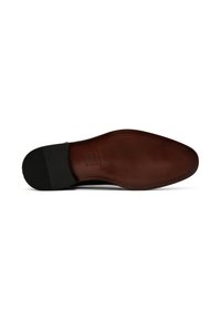 Semelle de chaussure en cuir marron avec un talon en caoutchouc noir. La semelle présente une texture lisse et une forme arrondie, avec des détails de marque estampés.