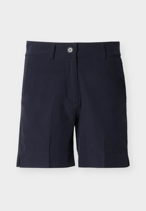 Pantalones cortos entallados de color azul marino con botón y trabillas para cinturón, bolsillos delanteros y aberturas laterales sobre un fondo gris claro.