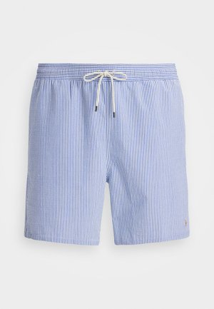 Shorts a rayas azul y blanca con cinturilla elástica, cordón y detalle de logo pequeño en el dobladillo. Tejido ligero con un ajuste relajado.