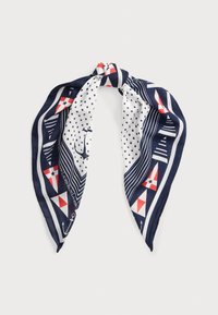 Tumši zila zīda šalle ar polka punktu, jūras motīvu un ģeometrisku formu rakstiem sarkanā un baltā krāsā, ar mezglotām galiem. Izmēri: 90x90 cm.