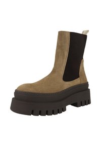 Bottine en daim marron avec panneaux latéraux élastiques, semelle plateforme noire épaisse et languette en boucle au talon.