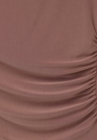 Brown, smooth fabric with gathered texture; features subtle sheen and soft draping. No visible patterns or hardware details.
