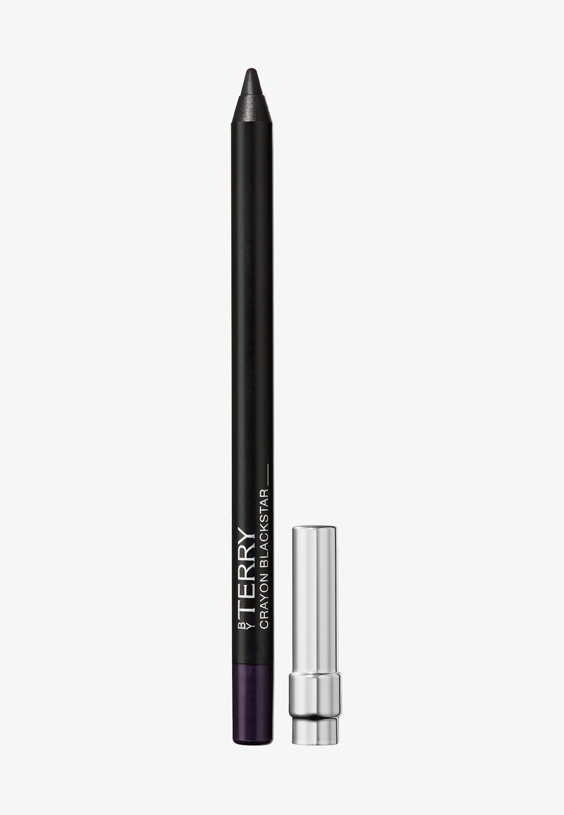 Crayon eye-liner noir étiqueté "By Terry Crayon Blackstar" avec le capuchon argenté retiré, présenté à côté du crayon sur fond blanc.