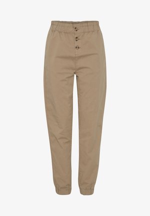 Pantalons étroits beiges en coton. Présentent une taille élastique, trois boutons sur le devant, et des poignets élastiques pour un ajustement confortable aux chevilles.