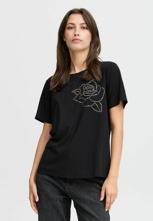 Black t-shirt with short sleeves and crew neckline, featuring a rose design made of silver rhinestones on the left chest area.