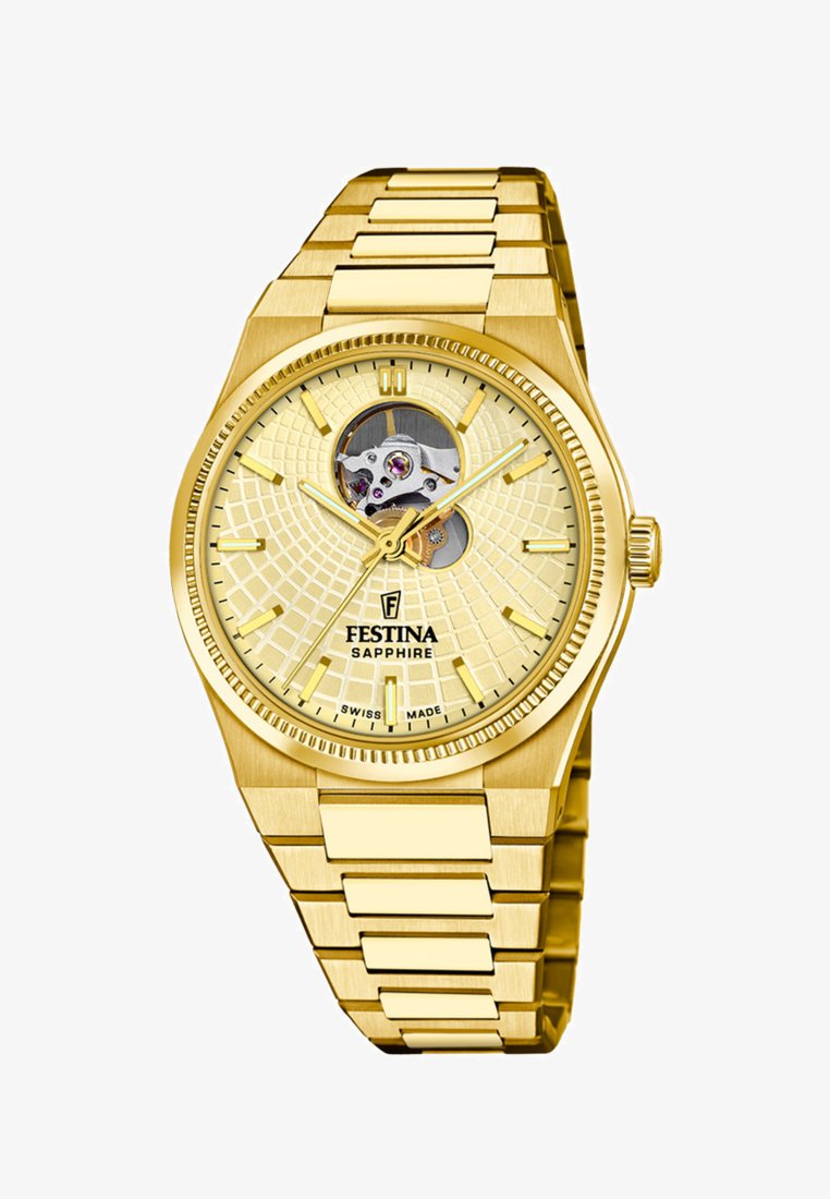 Zelta tonis Festina pulkstenis ar teksturētu dzeltenu ciparnīcu, atvērtas sirds dizainu, sapfīra kristālu un metāla saikņu aproci.