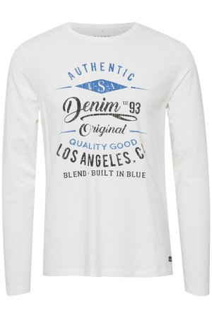 Hvid langærmet T-shirt med trykte blå og sorte tekster og grafikker. Blødt bomuldsmateriale, rund halsudskæring og en afslappet pasform.