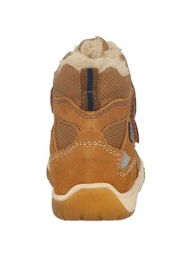 Bottine haute marron en matériaux en daim et en maille, dotée d'un doux col en fourrure, de deux sangles réglables et d'une semelle en caoutchouc texturée.