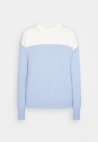 Ljust blåtröja med vitt mönstrat övre parti, ribbad rund halsringning och åtsittande manschetter. Tillverkad av mjukt stickat material. Zickzackad nederkant.