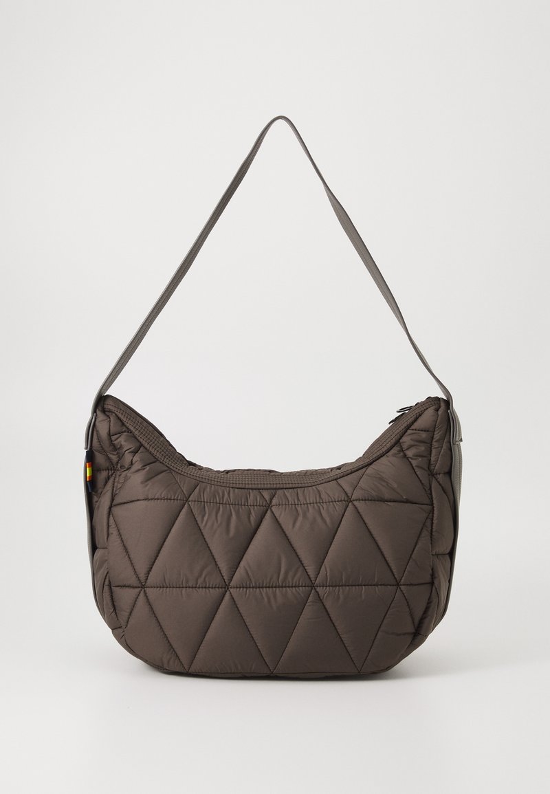 Brown quilted shoulder bag with a long gray strap and diamond-shaped stitching, displayed against a plain white background.