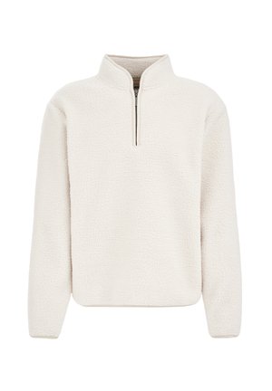 Pulover od flisa u boji off-white, s vratom na četvrtinu s patentnim zatvaračem, opuštenog kroja i teksturirane površine. Mekan i topao za slojevito nošenje.