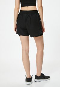 Koton Shorts - black