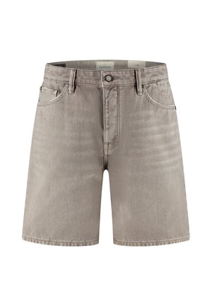 Světlé šedé džíny s knoflíkovým zapínáním, poutky na pásek a předními kapsami, zobrazené na bílém pozadí.