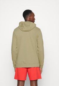 Nike Performance Felpa con zip - neutral olive/black