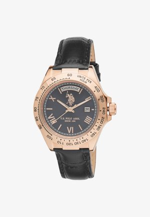 Montre ronde noire avec boîtier en acier inoxydable rose, bracelet en cuir noir, chiffres romains, affichage des jours de la semaine et fonction de date à 3 heures.