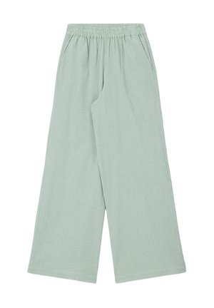 Pantalon large vert clair avec taille élastique et poches latérales, en tissu texturé.