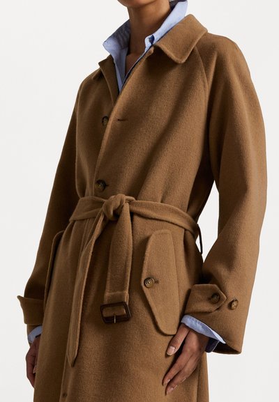 Brown wool coat with a tailored fit, shoulder epaulets, large pockets, and a belt. Features a notch collar and button closures.