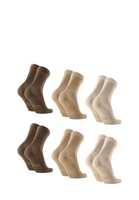 Set med sex par strumpor i olika nyanser av brunt och beige. De har en slät textur och ribbade muddar med subtil branding.