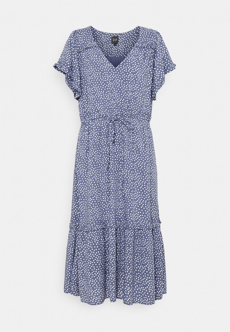 Robe midi bleue à pois blancs, col en V, manches courtes à volants, ceinture à la taille et jupe à volants superposés.