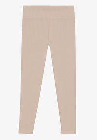 Beige geribbelde legging met een brede tailleband, ontworpen voor comfort. Gemaakt van rekbaar materiaal voor gemakkelijke beweging.