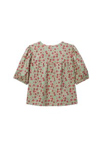 Blouse verte avec un motif floral rouge et rose, manches demi-ballon, et détail froncé au niveau du haut du dos.